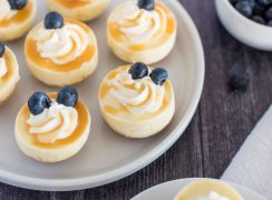 cheesecakes made in a pressure cooker with an egg mold topped with blueberries