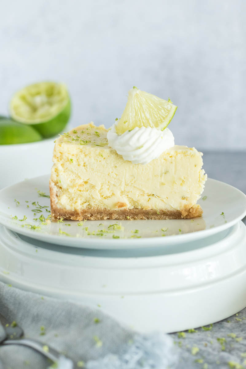 one slice of key lime pie with a graham cracker crust