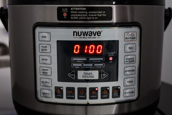 NuWave Pressure Cooker control pannel on the keep warm setting.