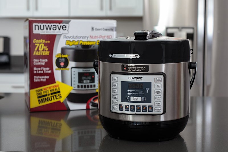 NuWave Pressure Cooker on a kitchen counter after being removed from the box.