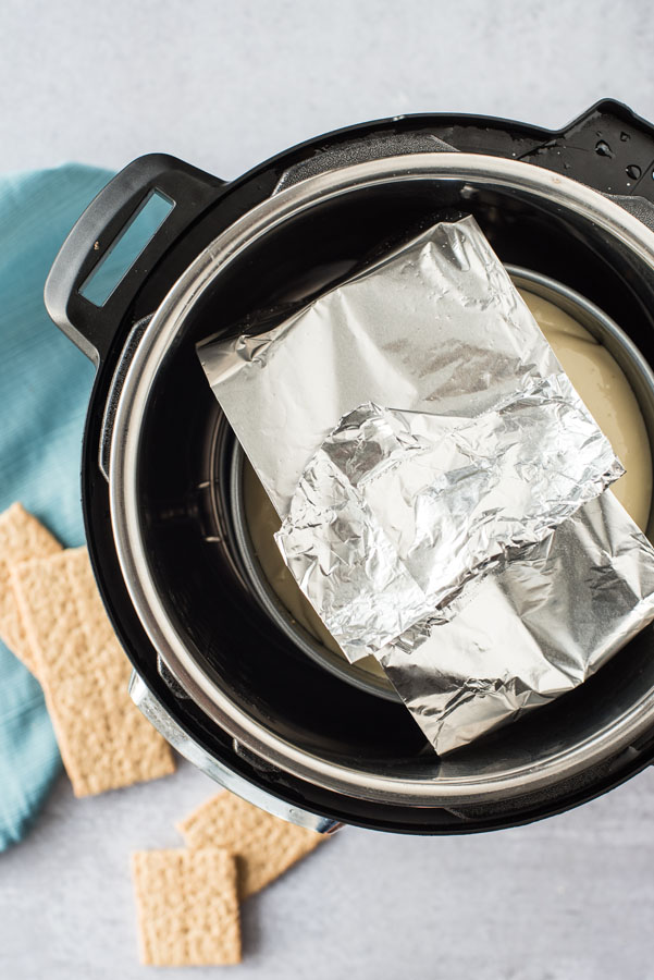 Making cheesecake in an Instant Pot using a foil sling.