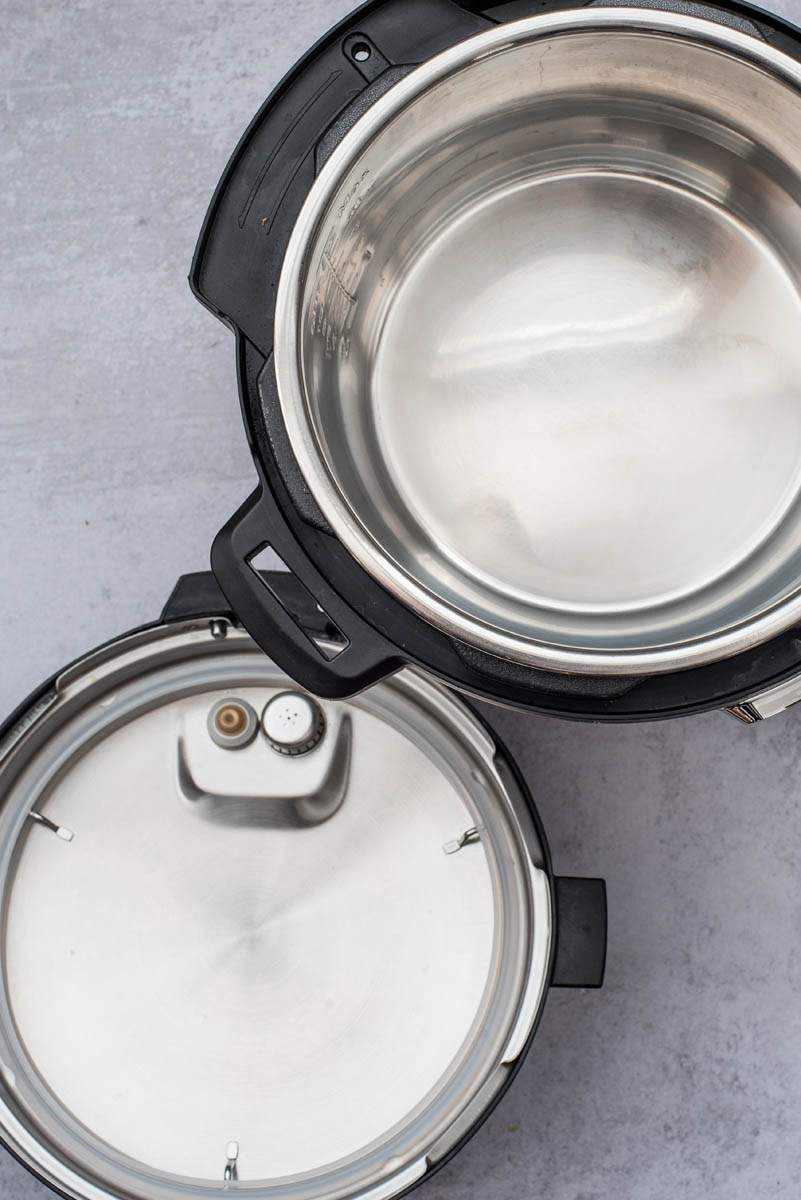 a top-down shot showing the silver cooking pot in place inside the pressure cooking housing