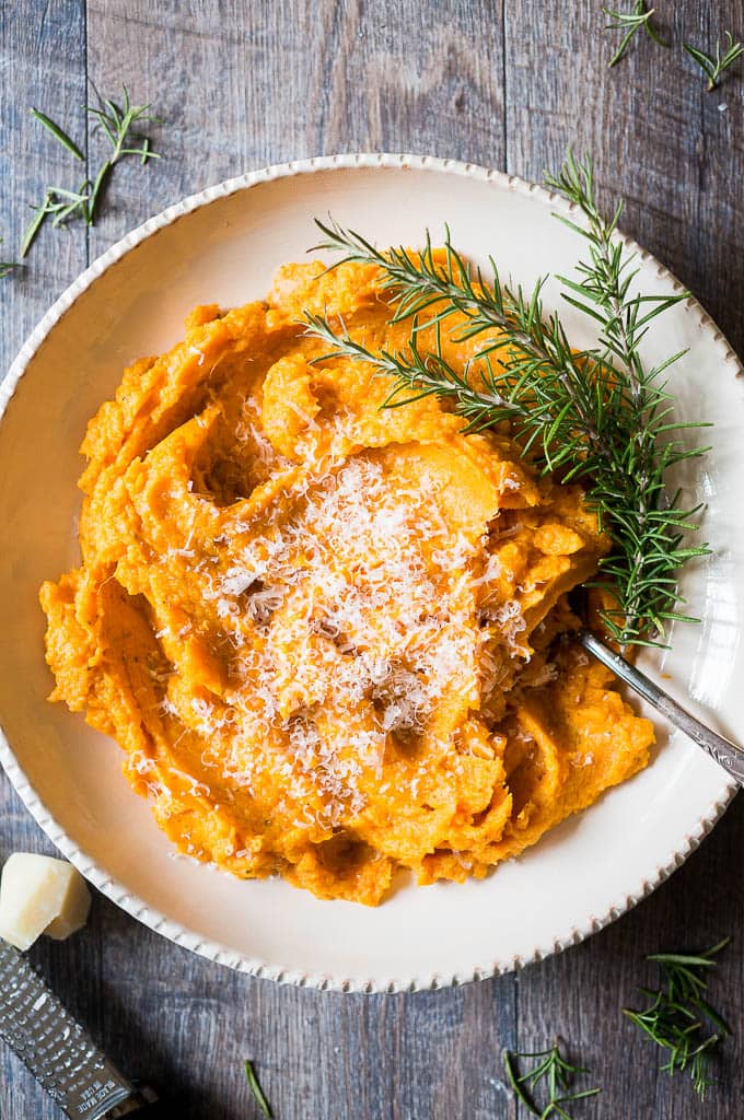 Pressure Cooker Savory Mashed Sweet Potatoes. in a large white serving bowl