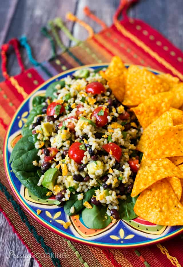 This Spicy Brown Rice Black Bean Salad is full of flavor with lots of great textures. The spicy lime dressing brightens up the salad and give it it\'s spicy kick. 