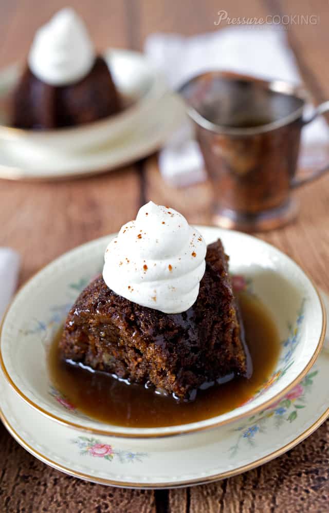 A moist, tender British style steamed pudding rich with warm spices and served with a buttery spiced rum sauce.